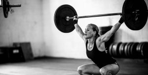 woman doing crossfit snatch